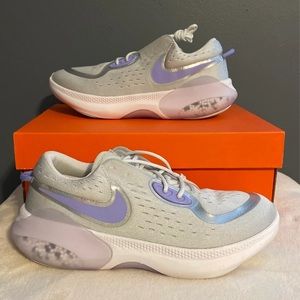 Nike Silver Athletic Shoes with Modern Sole Design